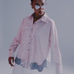 Pink shirt with feathers